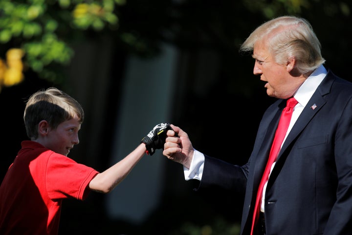 Frank's red polo coordinated well with the president's red tie.