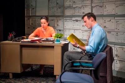 Caroline (Jamie Jones) discusses baby Luna's case with her boss, Cliff (Joshua Marx), in a scene from <strong><em>Luna Ga