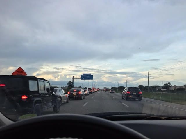 Left lane is a line for gas on the turnpike at the Ft. Pierce, Florida exit.