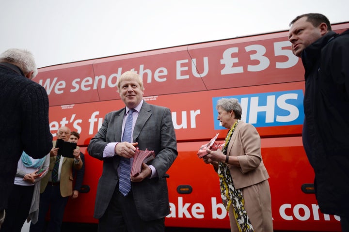 Boris Johnson in front of the battle bus plastered with the now-infamous £350m figure