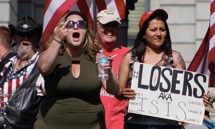 Anti-Muslim protesters at Denver's "March Against Sharia" oppose the implementation of Sharia law in the U.S.