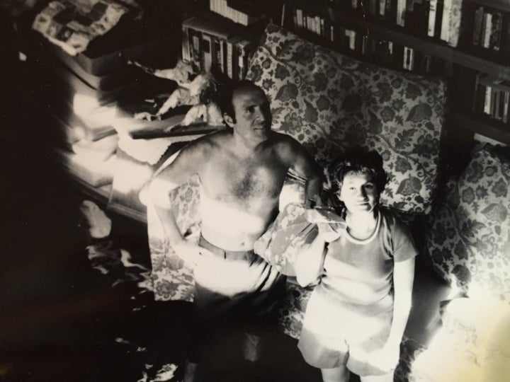 My parents in our flooded living room after Tropical Storm Doria. The water would rise to 6 feet.