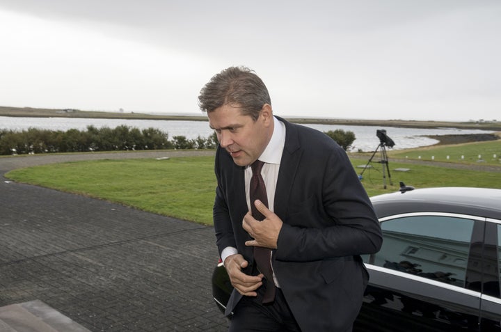 Prime Minister Bjarni Benediktsson arrives at the presidential residence in Bessastadir, Iceland, on Saturday. 