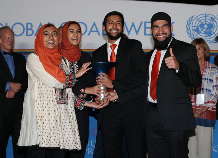 The Roshni Ride team from Rutgers University poses after winning the Hult Prize Finals on Saturday.