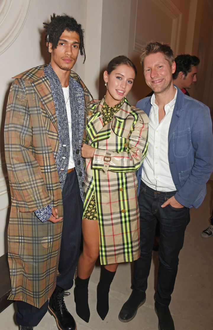 Kelvin Bueno and Iris Law with Burberry CEO Christopher Bailey.