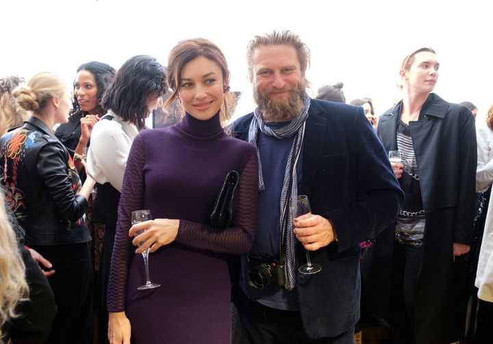 Olga Kurylenko with Greg Williams.