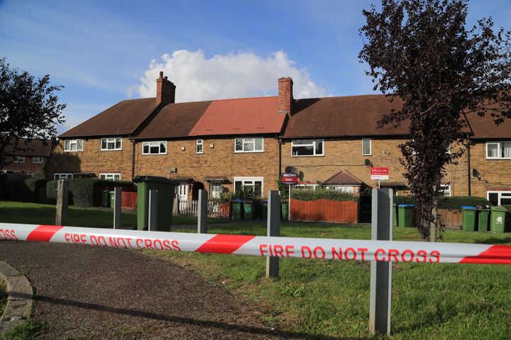 A cordon put in place by fire crews at Alwold Crescent in Lee, south London, where residents were rushed to hospital with nausea and vomiting amid fears of a chemical incident.