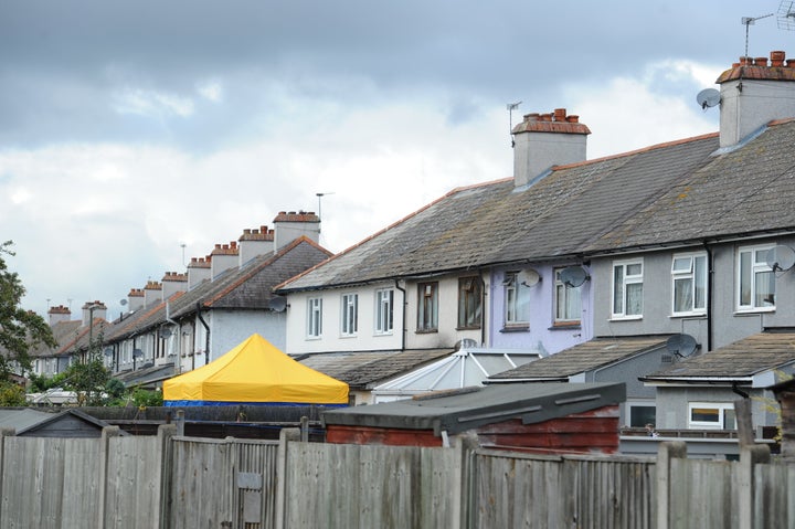 A police tent in the back garden of a house in Cavendish Road, Sunbury-on-Thames, Surrey, which is being searched by officers investigating the Parsons Green bombing.