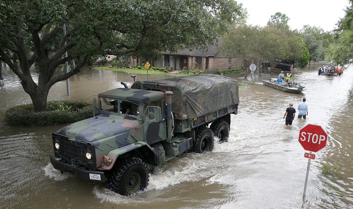 A military truck enters Lakeside Estate in Houston, Texas on August 30, 2017.