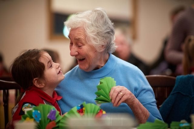 Nancy Cox, six, from 1st Northenden (St Wilfrid’s) Rainbows, with 82-year-old Jean Feltham.