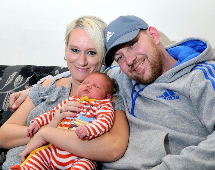 One week old Theo with his mum and dad Paula and Gareth Brown back home in Great Harwood