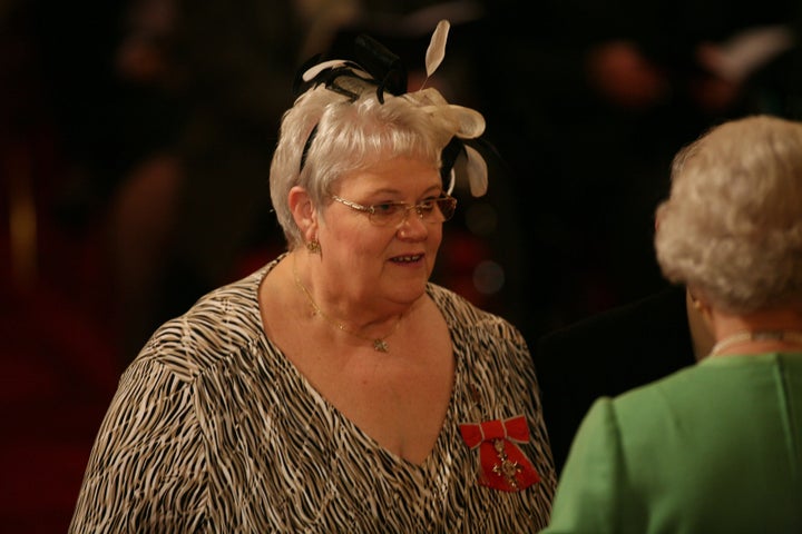 Penelope Jones as she receives her MBE