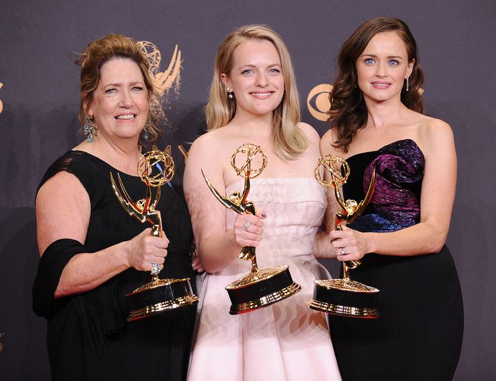 Actors Ann Dowd, Elisabeth Moss and Alexis Bledel pose with their acting Emmys for
