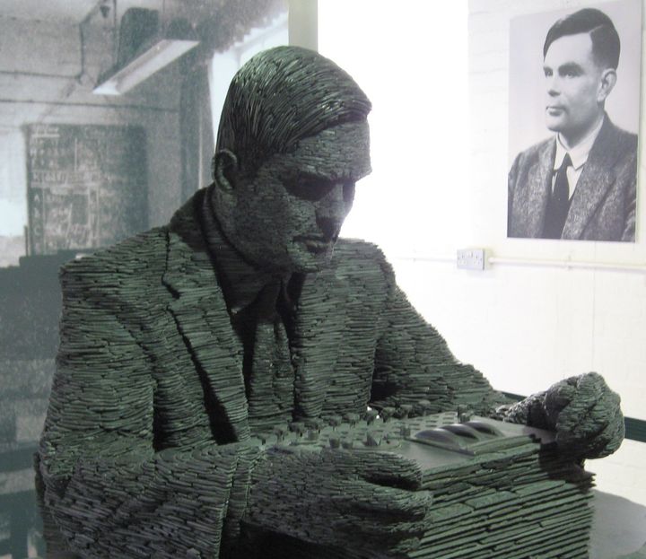 Statue of Alan Turing at Bletchley Park, where he led the effort to decode Enigma during World War II.
