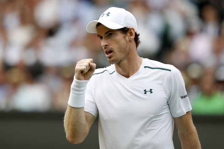 Andy Murray reacts after winning a point on the seventh day of the 2017 Wimbledon Championships on July 10. 