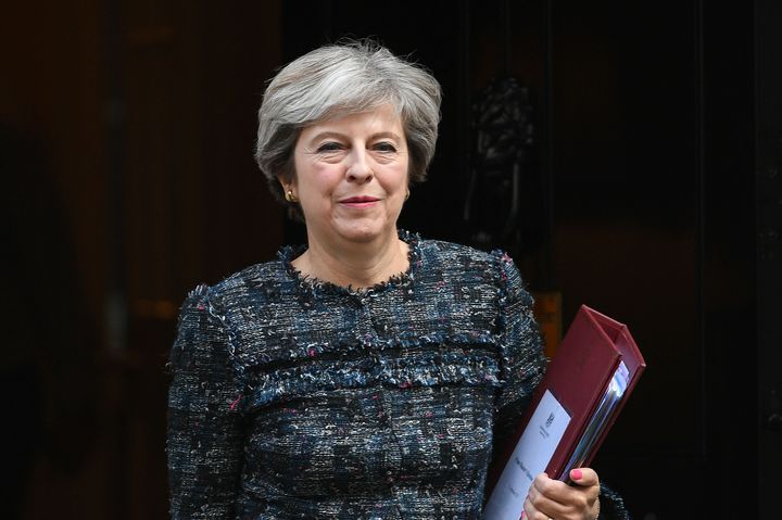 Theresa May is to meet internet companies on Wednesday. Policy Exchange said she should push them to go beyond 'very fine words' when dealing with extremist content
