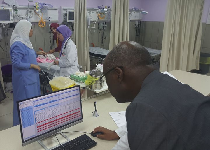 I get a demonstration of the health information system during a visit with health workers in the Pediatric Emergency Department at the Palestinian Medical Complex. 