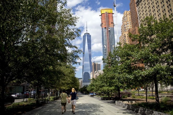 People walk along the Hudson River Greenway in New York City, Aug. 26, 2015.