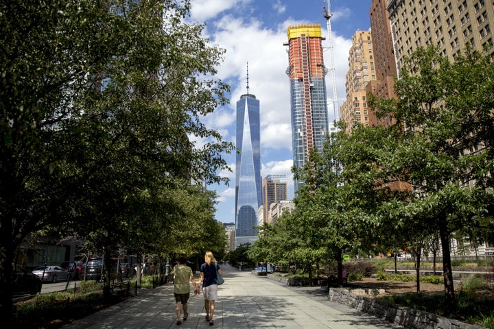 People walk along the Hudson River Greenway in New York City, Aug. 26, 2015.
