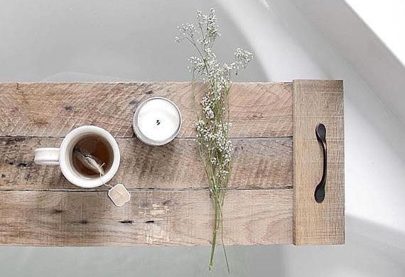 Fernweh Reclaimed Wood is one of several shops on Etsy that specializes in unique, handmade wooden decor like this wooden bath tray. 