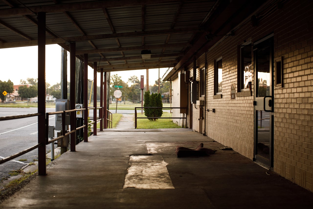 A crumpled rug sits outside the closed Lower Oconee Community Hospital in Glenwood.