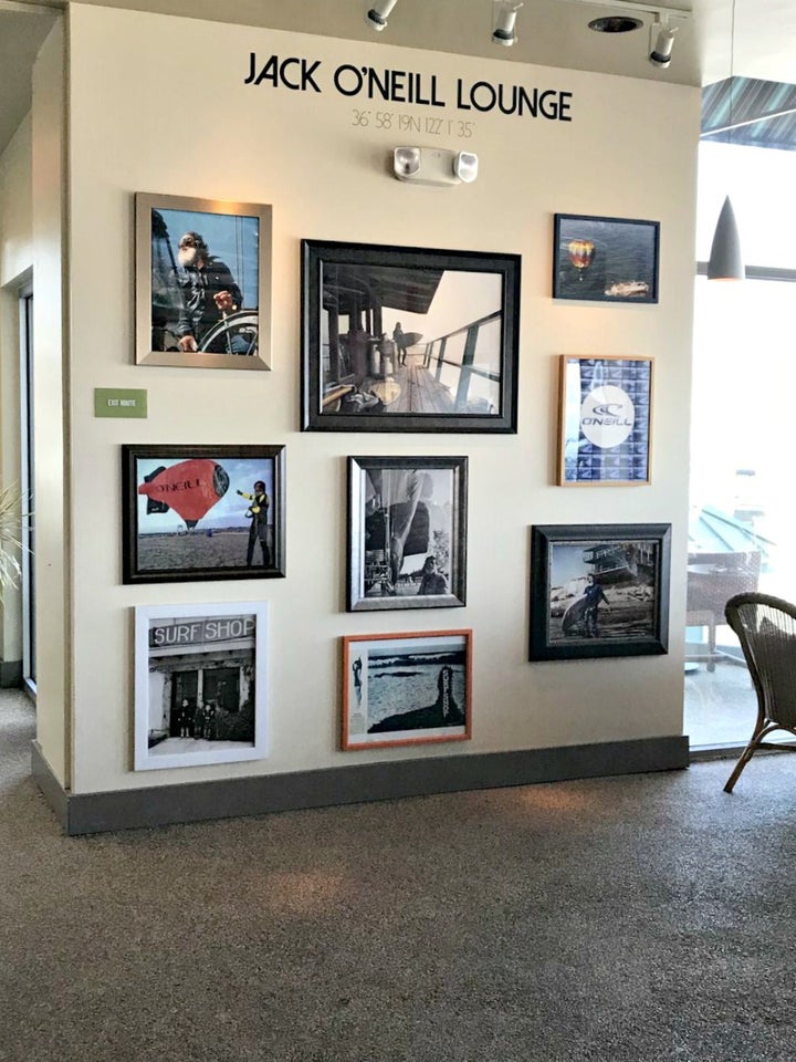 <p>Wall of Memorabilia at the Jack O’Neill Lounge, the approximate site of the world’s first Surf Shop</p>