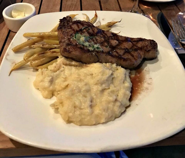<p>Grilled Steak with Mashed Potatoes and seasonal vegetables</p>