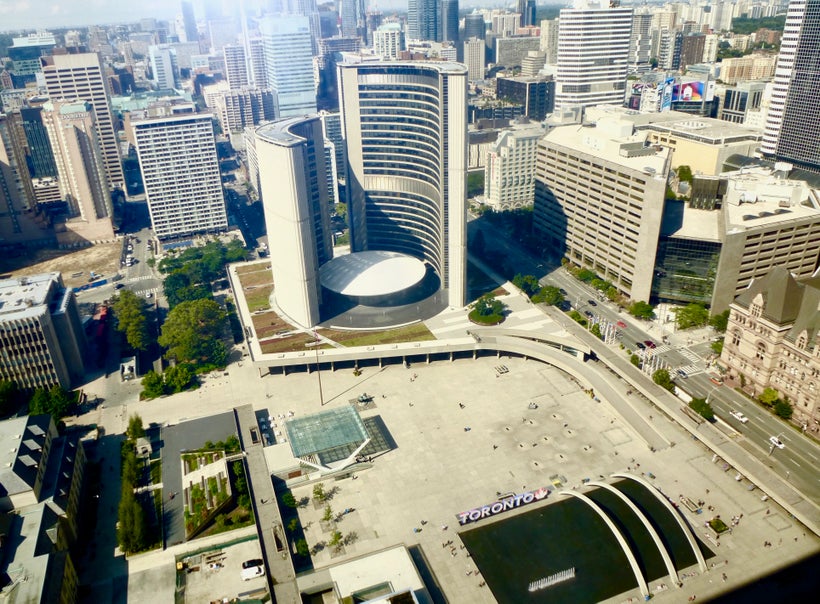 Club Lounge Dining room’s view of Toronto’s City Hall in Nathan Phillips Square.