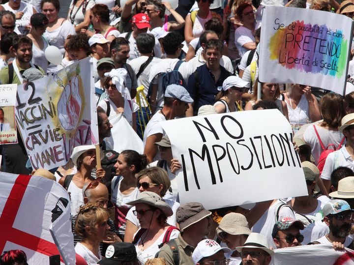 Demonstrators in Rome protest against imposition of vaccine requirements. 