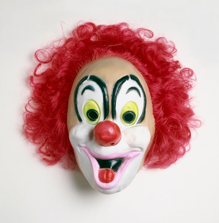 The father allegedly told police that he was only trying to discipline his daughter when he put on the clown mask, a sim