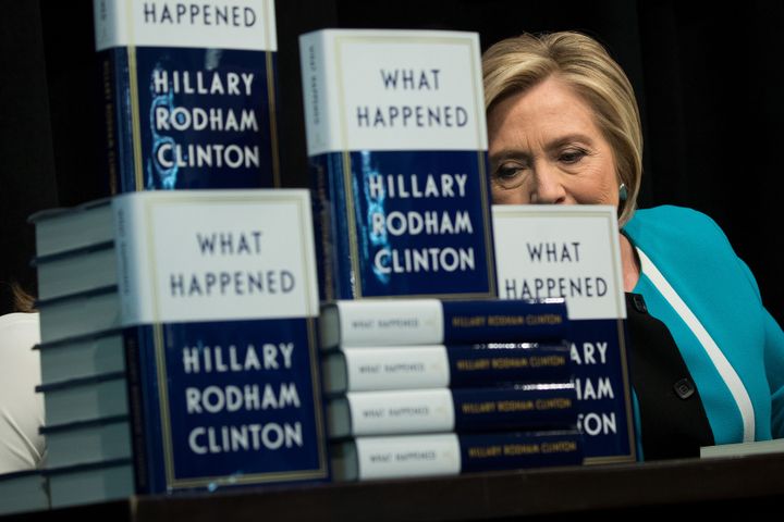Former Democratic presidential nominee Hillary Clinton signs copies of her book What Happened at a New York City bookstore last week.