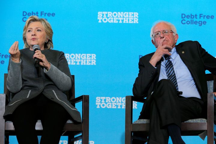 Former Democratic presidential candidates Hillary Clinton and Bernie Sanders appear at a campaign event in Durham, New Hampshire, on Sept. 28, 2016.
