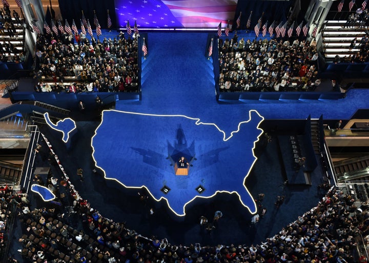 Hillary Clinton's campaign manager, John Podesta, addressing the crowd gathered during election night at the Javits Center in