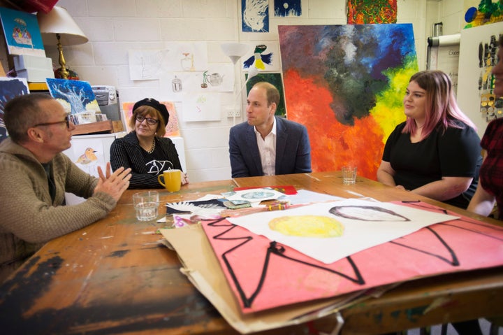 The Duke of Cambridge speaks to clients of the Spitafields Crypt Trust charity, including Heather Blackburn, Jason Malham and Grace Gunn