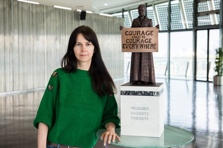 Artist Gillian Wearing with a model of the statue 