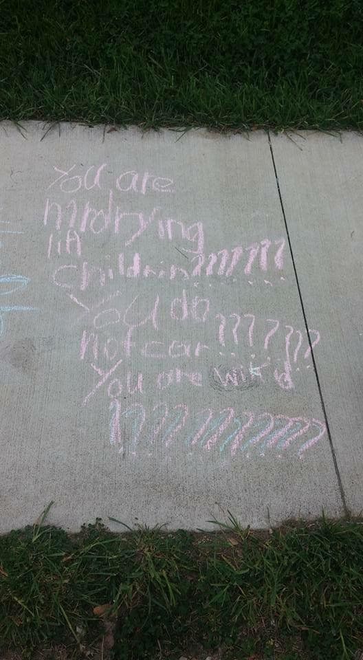 At the Planned Parenthood in Columbus, Ohio, two young girls regularly use chalk to write messages on the sidewalk by the clinic.