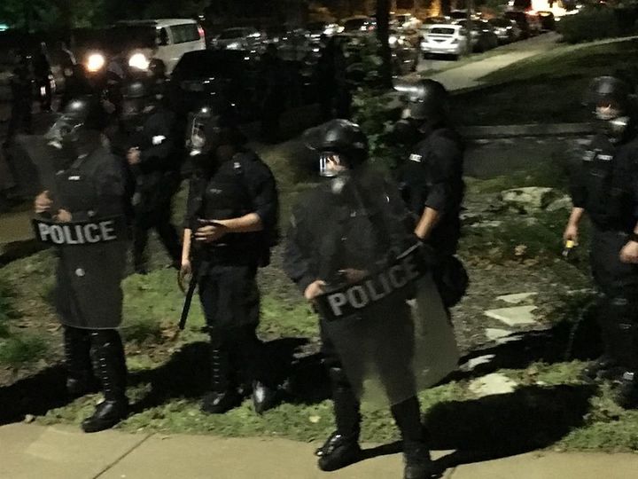 Riot police are seen in St. Louis on Sept. 15.