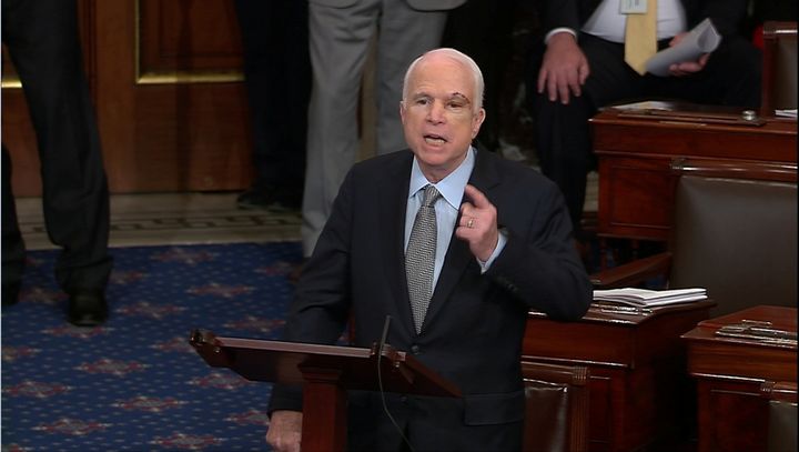 Sen. John McCain (R-Ariz.) speaks on the floor of the Senate after returning to Washington for a vote July 25 on health care reform, soon after being diagnosed with brain cancer.