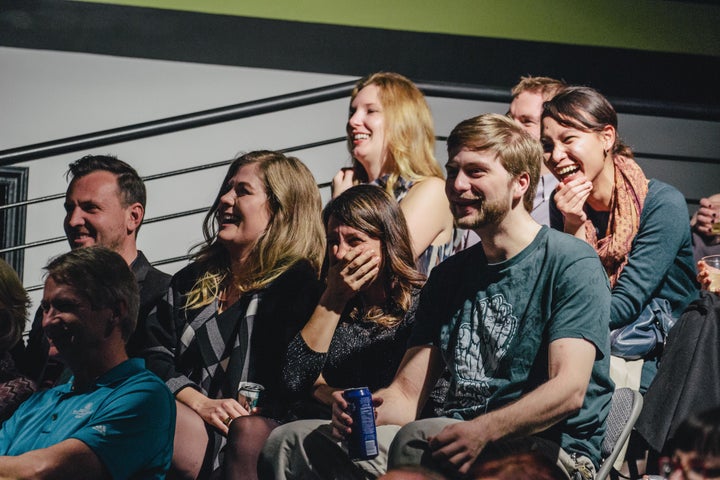 People attending a comedy show at Dad's Garage in Atlanta Georgia.