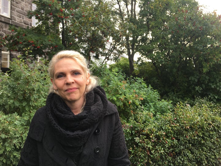 Birgitta Jónsdóttir, in the garden outside Iceland's Parliament House, on Monday morning, says she worries the prime minister will take advantage of his time before an Oct. 28 snap election.