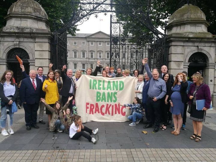 Campaigners celebrate Ireland’s legislative ban on fracking outside Government buildings, June 2017
