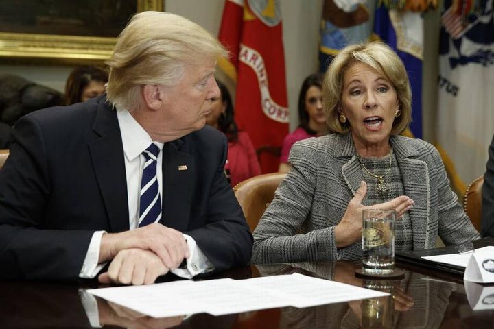 President Trump (l) and Secretary of Education DeVos are in the vanguard of a rightwing assault on teacher unions and public education.