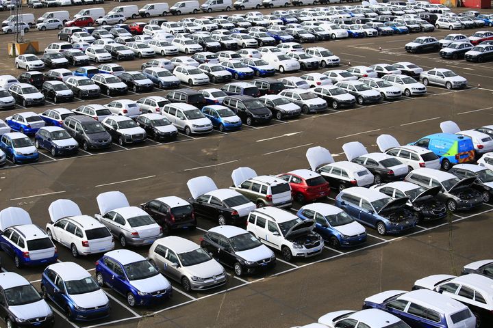Greenpeace volunteers are attempting to immobilise VW cars at a vehicle park in Sheerness, Kent 
