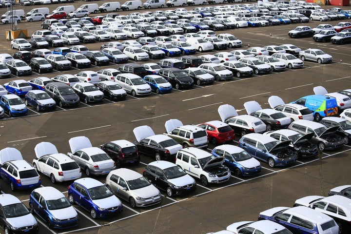 Greenpeace volunteers are attempting to immobilise VW cars at a vehicle park in Sheerness, Kent 