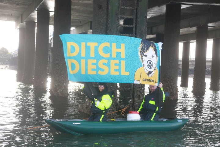 Protestors drew up alongside the ship in kayaks and small boats 