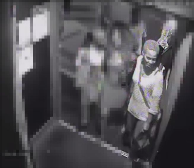 This woman was pictured in the doorway of Flex nightclub at around 2.23am 