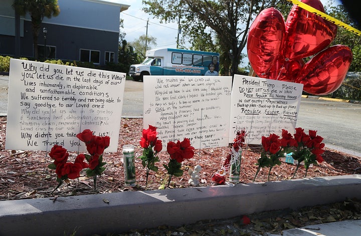 Messages have been left on the sidewalk of the Rehabilitation Center at Hollywood Hills in the days since 11 patients fell il