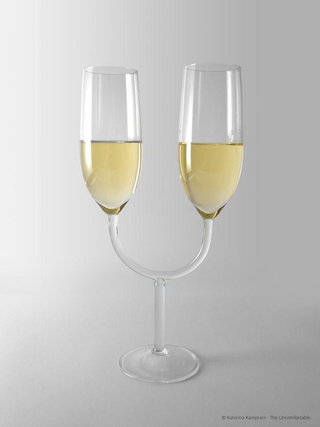 The best way to use these champagne glasses is with your face smushed against someone else's while taking sips at exactly the same time. Actually, that's the only way.