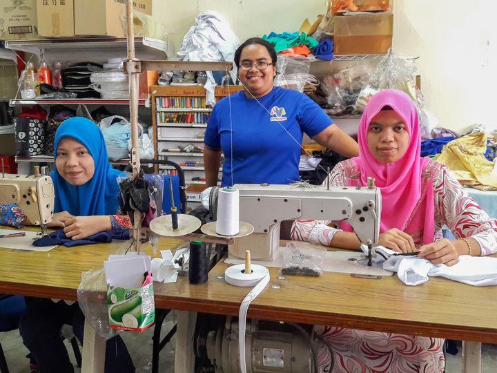 Baitulhusna (center) leads Nazkids, an inclusive social business empowering young women with its brand of baby clothing.