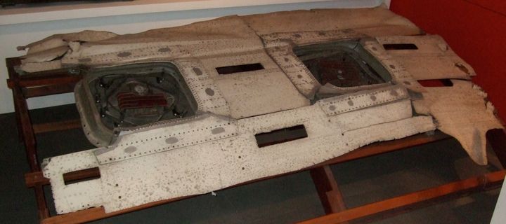 This is the actual fragment skin that peeled off the de Havilland Comet G-ALYP, retrieved from the ocean floor, that allowed investigators to figure out the flaw that caused several crashes. Photo by Tim Farley, CC BY-SA 3.0